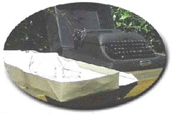 Box of paper next to an old typewriter, with the caption 'The way it was'.